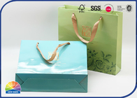 Embossed Gold Logo Luxury Paper Shopping Bags With Ribbon Handles ！